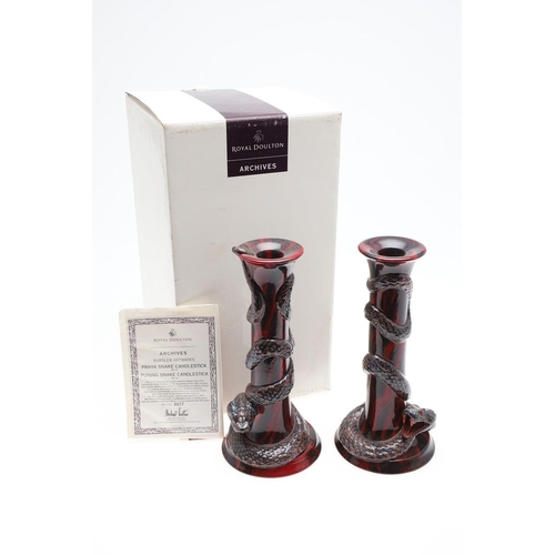 698 - PAIR OF ROYAL DOULTON ARCHIVES FLAMBE CANDLESTICKS. A pair of Royal Doulton Flambe candlesticks, Pan... 