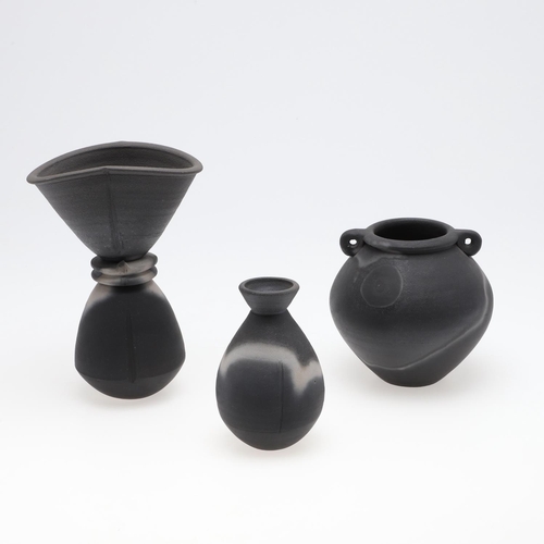 705 - JOHN LEACH (1939-2021) - BLACK BURNISHED STUDIO POTTERY VASES. Three black burnished vases including... 