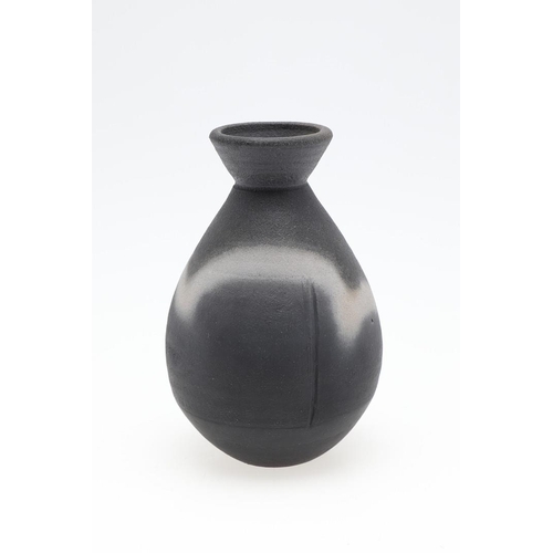 705 - JOHN LEACH (1939-2021) - BLACK BURNISHED STUDIO POTTERY VASES. Three black burnished vases including... 