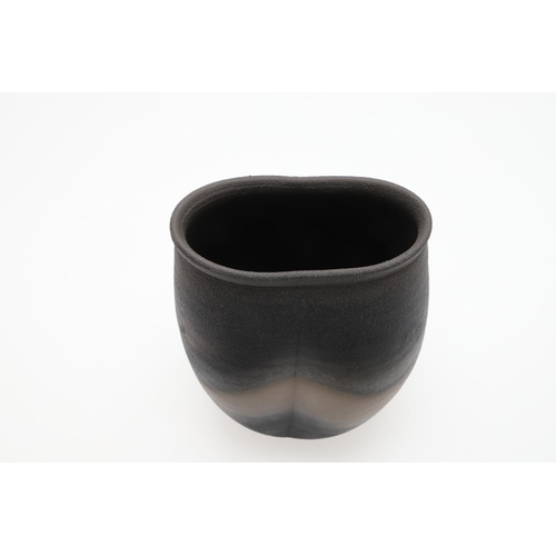 706 - JOHN LEACH (1939-2021) - BLACK BURNISHED STUDIO POTTERY VASES. Four various stoneware vases with a b... 