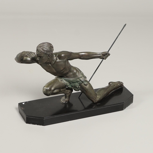 716 - JEAN DE RONCOURT - FRENCH ART DECO SPELTER FIGURE. A patinated spelter figure of a hunter holding a ... 