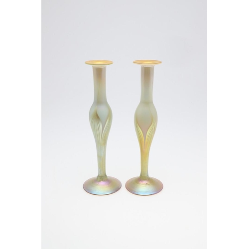 725 - LOUIS COMFORT TIFFANY - PAIR OF FAVRILE IRIDESCENT GLASS VASES. A pair of slender iridescent glass v... 