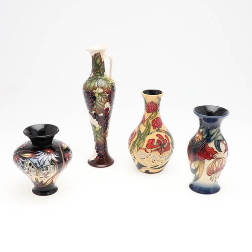 727 - MOORCROFT POTTERY VASES & JUG. Four items of modern Moorcroft pottery including a vase in the Mustar... 