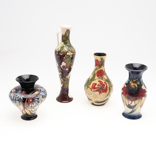 727 - MOORCROFT POTTERY VASES & JUG. Four items of modern Moorcroft pottery including a vase in the Mustar... 