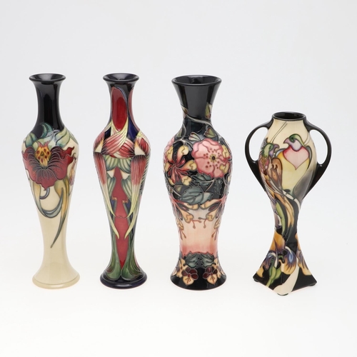 731 - MOORCROFT - FOUR MODERN VASES INCLUDING 'TRINITY'. Including a large slender vase in the 'Anna Lily'... 