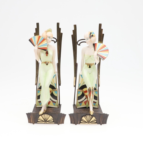 735 - ALBANY CHINA - PAIR OF ART DECO FIGURES. A pair of modern Albany China figures of Art Deco ladies in... 