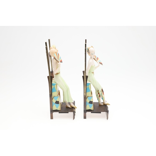 735 - ALBANY CHINA - PAIR OF ART DECO FIGURES. A pair of modern Albany China figures of Art Deco ladies in... 