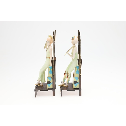 735 - ALBANY CHINA - PAIR OF ART DECO FIGURES. A pair of modern Albany China figures of Art Deco ladies in... 