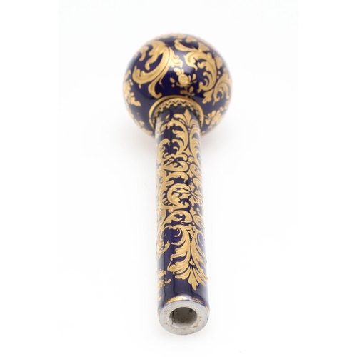 745 - CONTINENTAL PORCELAIN PARASOL HANDLE. Probably French, the top painted with a courting couple within... 