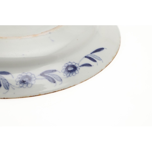 793 - 18THC CHINESE BLUE & WHITE DISH. An 18thc dish or bowl of shallow form, painted with a central flowe... 