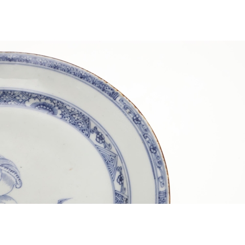 793 - 18THC CHINESE BLUE & WHITE DISH. An 18thc dish or bowl of shallow form, painted with a central flowe... 