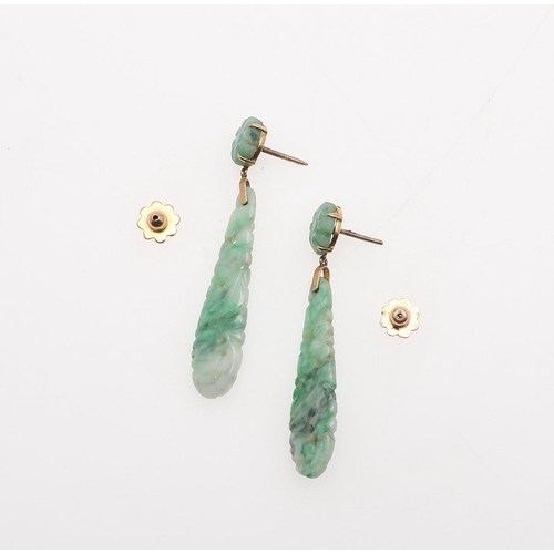 1037 - A PAIR OF JADE AND GOLD DROP EARRINGS. each formed with a drop of carved and pierced jade suspended ... 