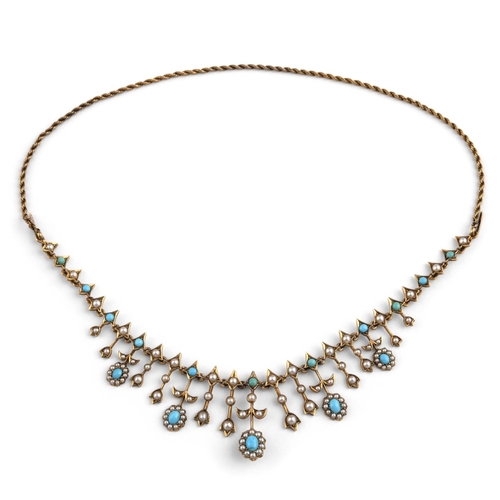 1045 - A TURQUOISE AND PEARL SET FRINGE NECKLACE. mounted alternately with pearl set foliate drops and turq... 