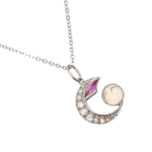 1056 - A MOONSTONE, RUBY AND DIAMOND MAN IN THE MOON PENDANT. mounted with a carved moonstone, graduated ol... 