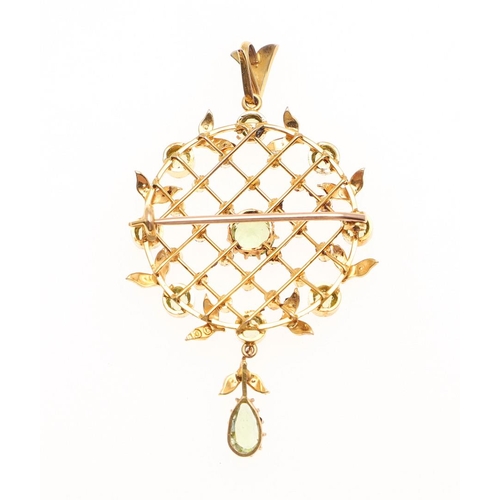 1062 - A PERIDOT AND PEARL BROOCH PENDANT. the 9ct gold mount of lattice design, set with circular-cut peri... 