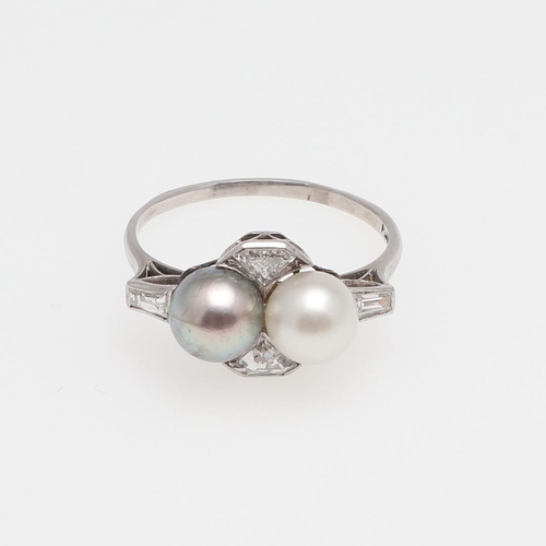 1072 - A DIAMOND AND PEARL RING. mounted with an untested grey cultured pearl and a white cultured pearl, a... 