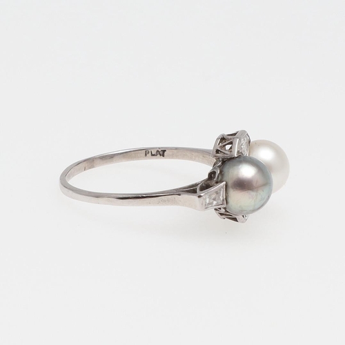 1072 - A DIAMOND AND PEARL RING. mounted with an untested grey cultured pearl and a white cultured pearl, a... 