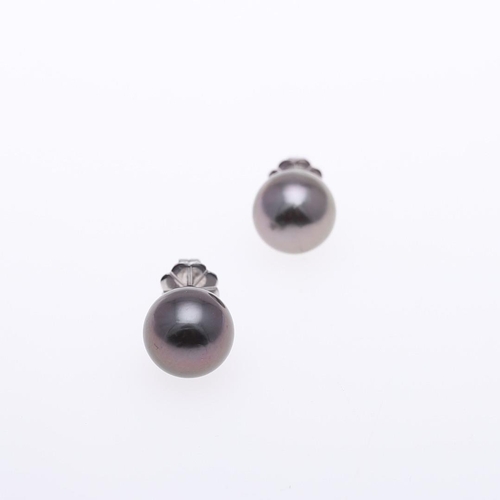 1087 - A PAIR OF BLACK SOUTH SEA CULTURED PEARL STUD EARRINGS. each earring mounted with a black South Sea ... 