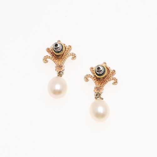 1088 - A PAIR OF CULTURED PEARL AND GOLD DROP EARRINGS. each earring set with a cultured pearl drop suspend... 