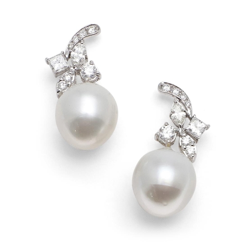 1090 - A PAIR OF DIAMOND AND CULTURED PEARL DROP EARRINGS. each earring set with a cultured pearl measuring... 