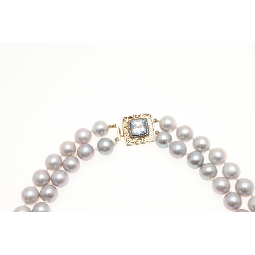 1091 - A DOUBLE ROW UNIFORM CULTURED PEARL CHOKER. the grey cultured pearls measure approximately 11.5-12.0... 