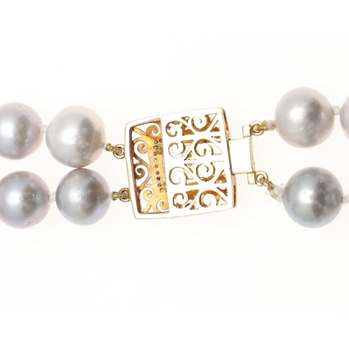 1091 - A DOUBLE ROW UNIFORM CULTURED PEARL CHOKER. the grey cultured pearls measure approximately 11.5-12.0... 