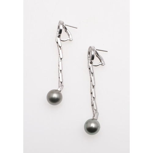 1094 - A PAIR OF DIAMOND AND CULTURED PEARL DROP EARRINGS. each earring formed with a flexible white gold d... 