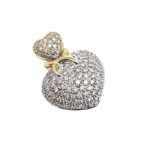 1110 - A DIAMOND AND 18CT GOLD HEART-SHAPED PENDANT. mounted overall with circular-cut diamonds, 2.2cm wide... 