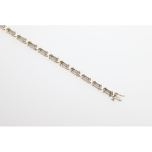 1111 - A DIAMOND AND GOLD BRACELET. formed alternately with sections of circular-cut diamonds and a gold cr... 