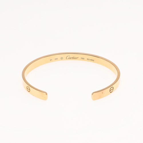 1116 - AN 18CT ROSE GOLD LOVE BANGLE BY CARTIER, signed Cartier to the inside, numbered EQ 4892, internal m... 