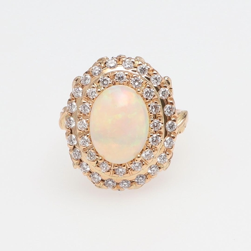 1122 - AN OPAL AND DIAMOND CLUSTER RING. the oval-shaped solid white opal is set within a double surround o... 