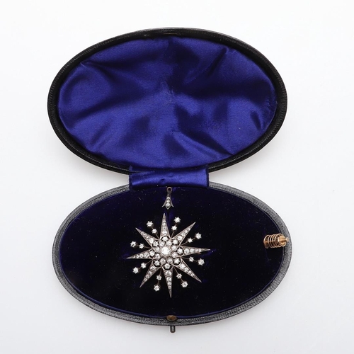 1146 - A VICTORIAN DIAMOND STAR BROOCH PENDANT. set overall with graduated circular old-cut diamonds in sil... 