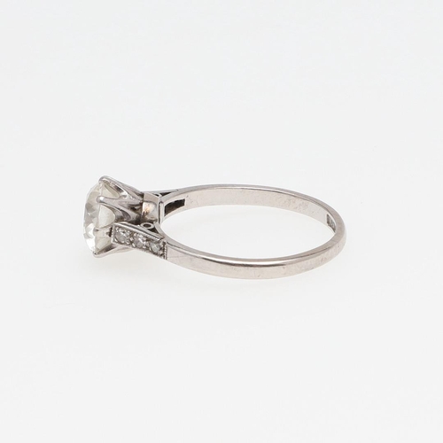 1150 - AN EDWARDIAN DIAMOND SOLITAIRE RING. the round old-cut diamond weighs approximately 1.90 carats and ... 