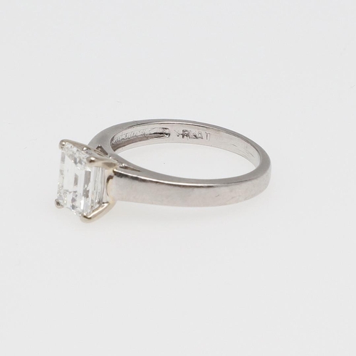 1155 - A DIAMOND SOLITAIRE RING. set with an emerald-cut diamond weighing 1.51 carats in platinum, 4.6 gram... 