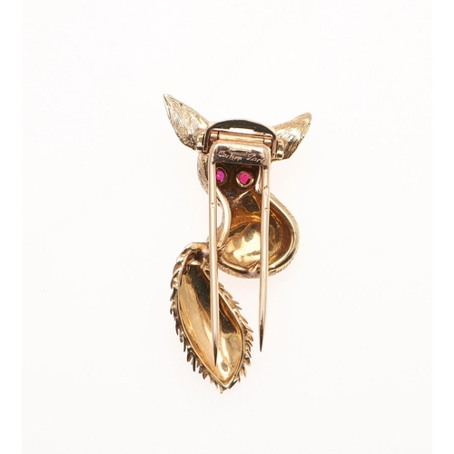 1156 - AN 18CT GOLD FENNEC FOX BROOCH BY CARTIER. realistically formed, with ruby eyes, signed Cartier Pari... 