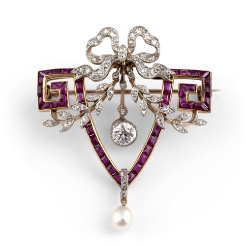 1161 - A BELLE EPOQUE RUBY AND DIAMOND BROOCH PENDANT. the openwork mount is set with calibre-cut rubies, w... 