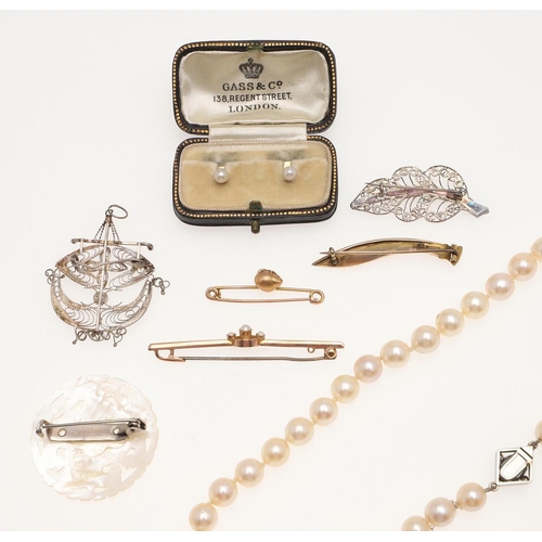 835 - A QUANTITY OF JEWELLERY. including a gold charm bracelet, a cultured pearl single row choker, with a... 