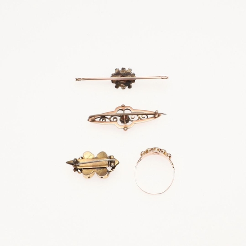 842 - THREE GARNET SET BROOCHES AND A GARNET RING. an early Victorian gold brooch set with four foil backe... 