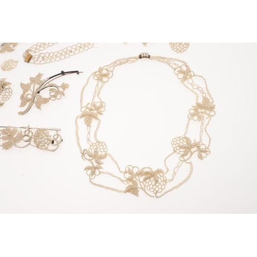 846 - A VICTORIAN SEED PEARL NECKLACE. of foliate intricate design, 44cm long, together with a seed pearl ... 