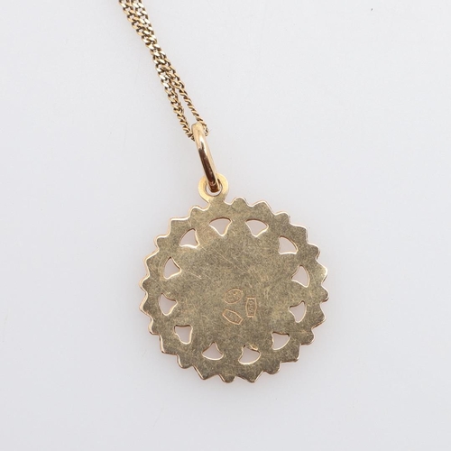 858 - AN 18CT GOLD PENDANT. of circular form with embossed Arabic letter, on an 18ct gold chain, total wei... 