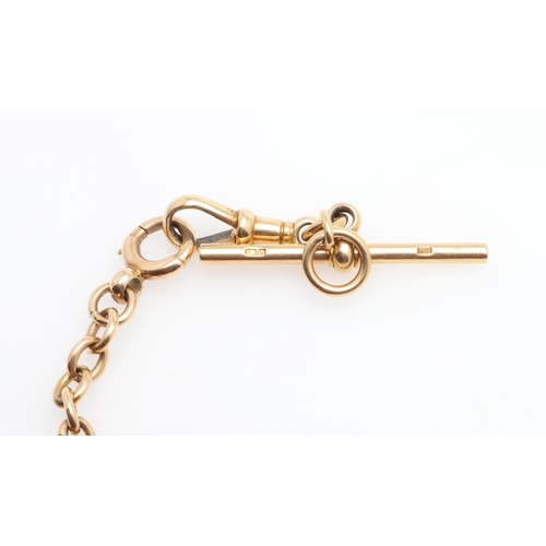 859 - A 15CT GOLD CURB LINK WATCH CHAIN. each link stamped 15 625, suspending an 18ct gold 't' bar, the wa... 