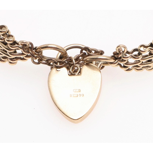 860 - A 9CT GOLD FANCY GATE LINK BRACELET. with foliate engraved padlock clasp, 17cm long, 22.6 grams.  *C... 