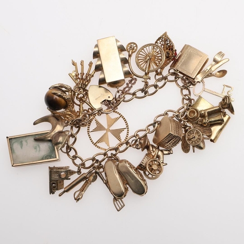 862 - A 9CT GOLD CHARM BRACELET. the oval links are alternately stamped for 9 375, with padlock clasp and ... 