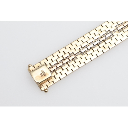 863 - A 9CT THREE COLOUR GOLD BRACELET. of geometric openwork design with engraved decoration, with concea... 