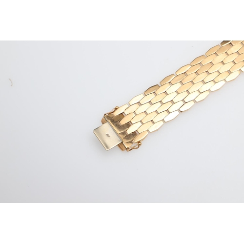 865 - AN 18CT GOLD PANEL BRACELET. formed with undulating plain and foliate engraved links to a concealed ... 