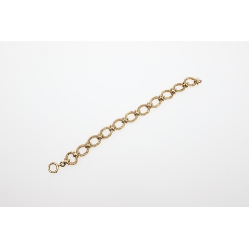 885 - A 9CT GOLD FANCY LINK BRACELET. formed with oval-shaped textured links, 18cm long, 29.4 grams.  *Con... 