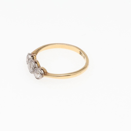 887 - A DIAMOND THREE STONE RING. collet set with three graduated old-cut diamonds, in 18ct gold, 1.7 gram... 