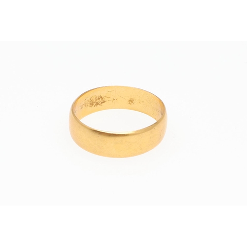 893 - A 22CT GOLD WEDDING BAND. 5.1 grams, size O, together with a 22ct gold wedding band, 5.0 grams, size... 