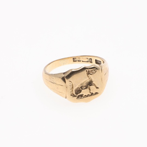 898 - AN 18CT GOLD SIGNET RING. engraved with a crest, 7.6 grams, size G, together with a 9ct gold signet ... 