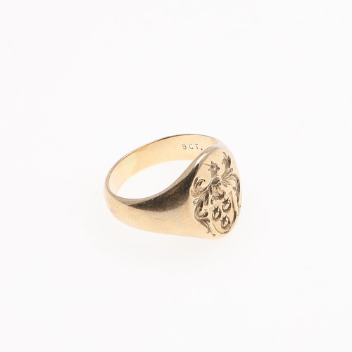 898 - AN 18CT GOLD SIGNET RING. engraved with a crest, 7.6 grams, size G, together with a 9ct gold signet ... 